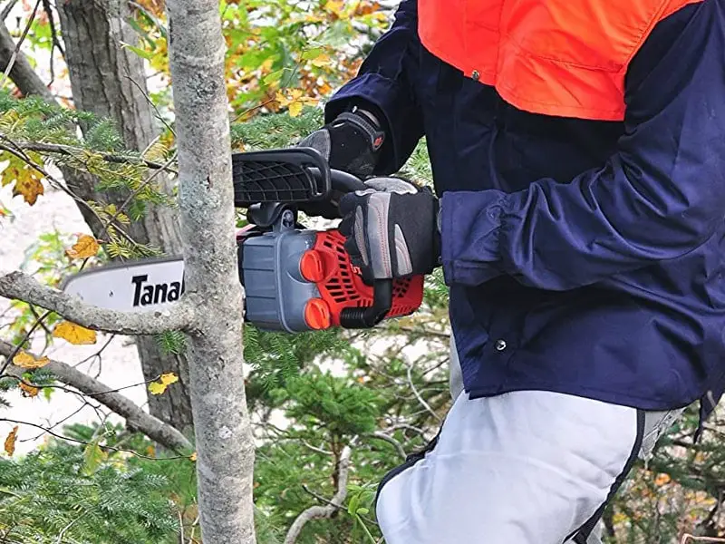 man working with small chainsaw