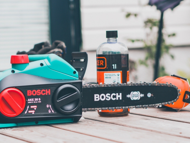 black-and-teal-Bosch-chainsaw