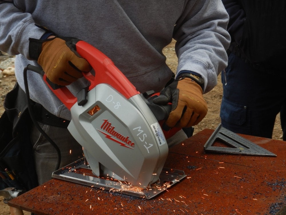 circular saw cutting a steel plate