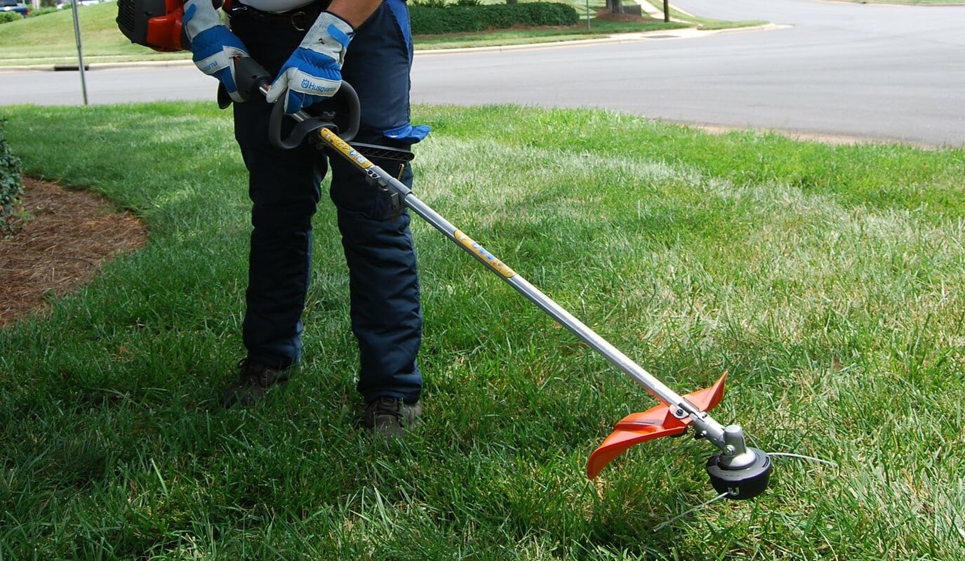 how to hold string trimmer