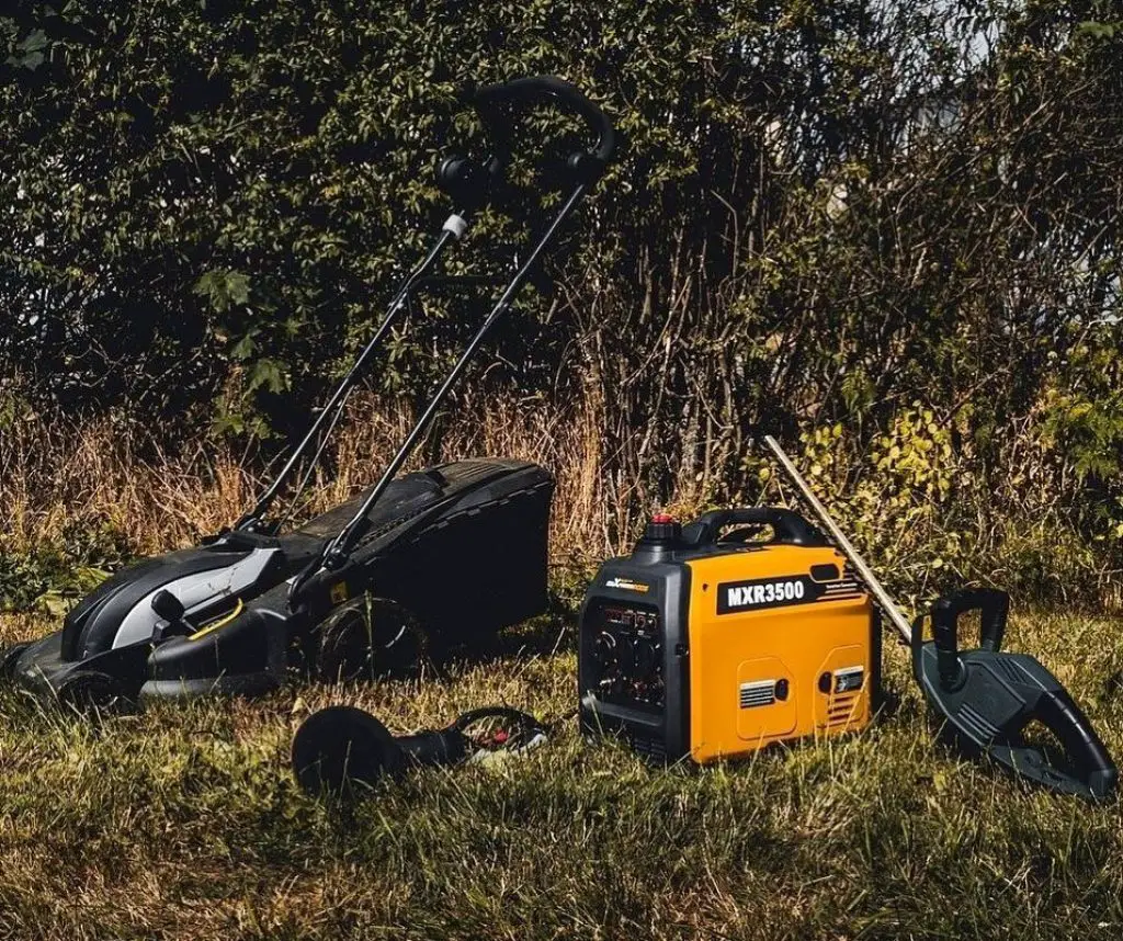 yellow generator and lawnmowers