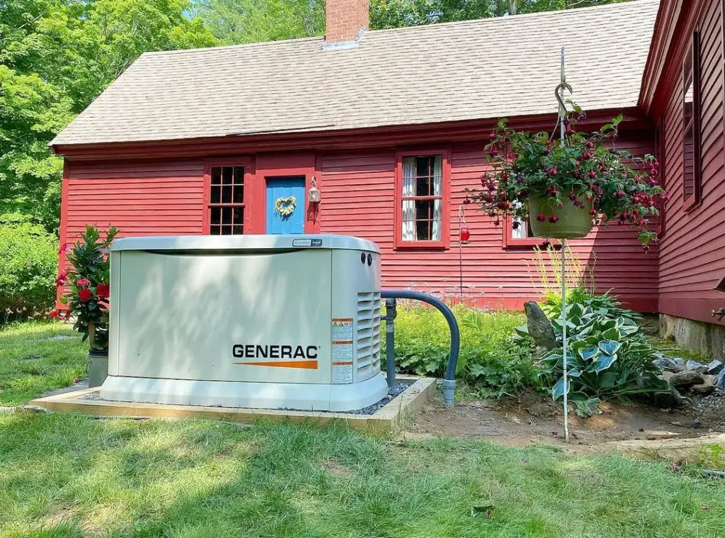 Generator in front of the red house
