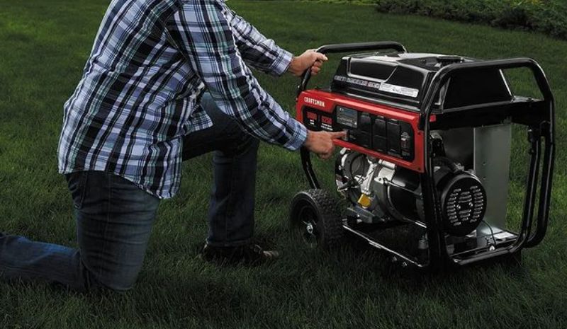 Man turning on the generator