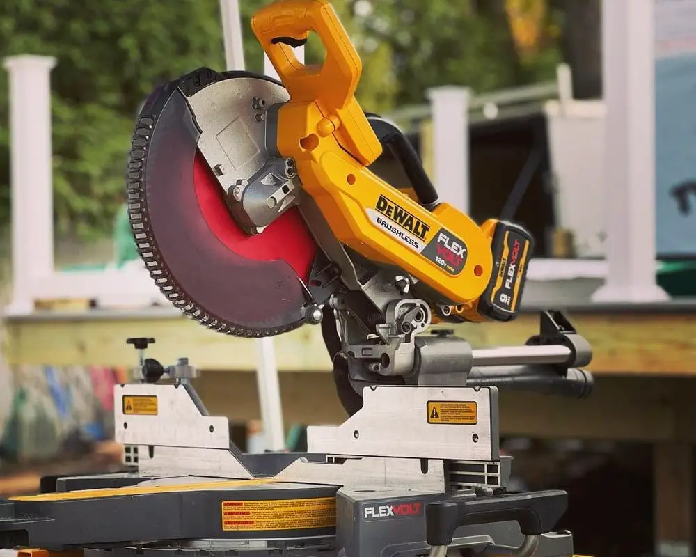 Yellow miter saw on the table